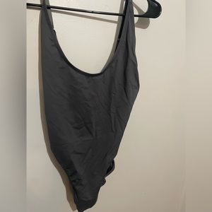 Skims one piece bikini